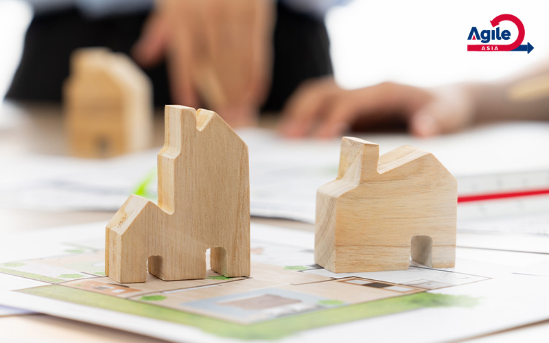 Wooden models and plans showing sustainable development.